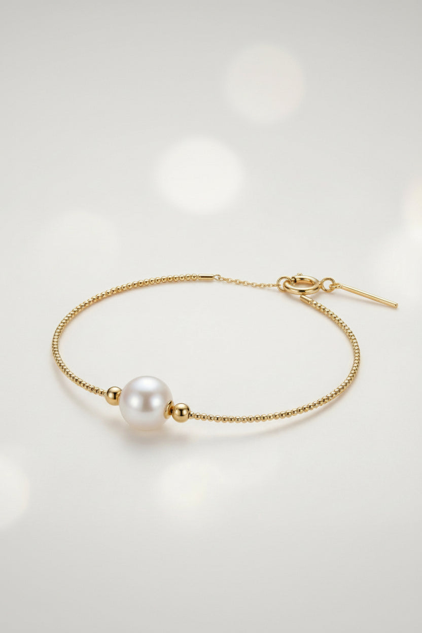 Krishna - Pulsera Oro Amarillo 18K y Perla 8mm